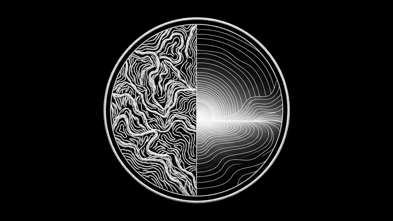 A circular patch split between thick embroidered thread and a smooth photographic gradient transition.